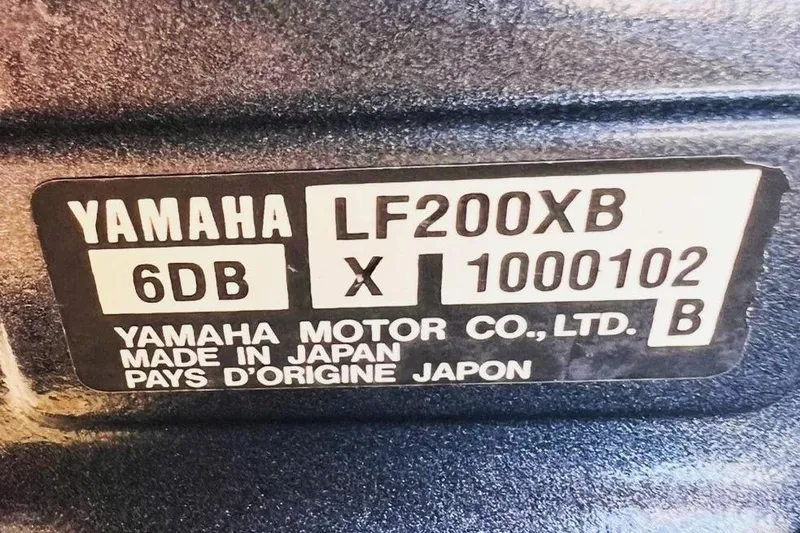 Slide: The Image of Yamaha LF200XB engine label on 2013 Scout 275 LXF, made in Japan. - 14