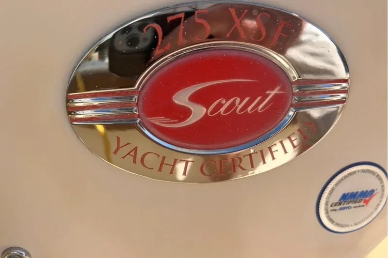 Slide: The Image of 2013 Scout 275 LXF yacht certified emblem with NMMA certification badge. - 18