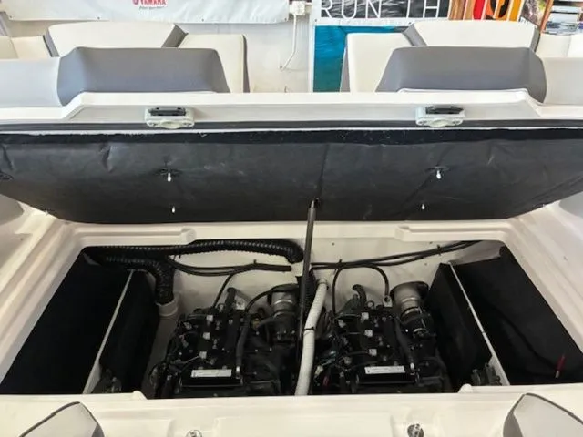 Slide: The Image of Engine compartment of 2026 Yamaha Boats AR220 with dual engines. - 20