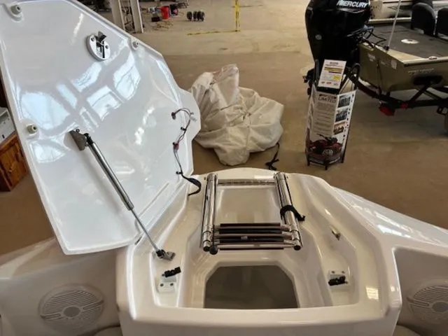 Slide: The Image of Yamaha Boats AR220 2026 with open storage hatch and ladder. - 6