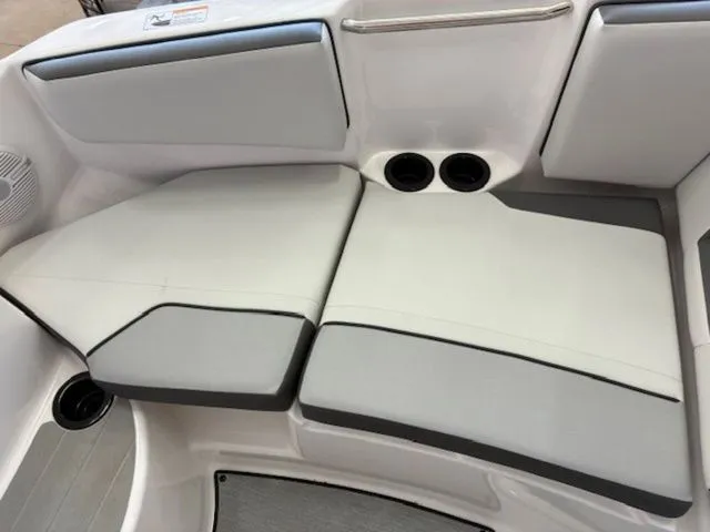 Slide: The Image of 2026 Yamaha AR220 boat interior with gray upholstery. - 7