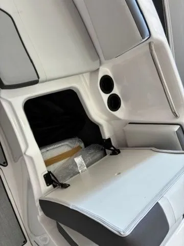 Slide: The Image of Interior of 2026 Yamaha AR220 boat with storage compartment. - 8