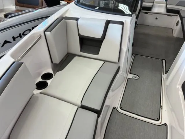 Slide: The Image of Interior of 2026 Yamaha Boats AR220 with gray and white seating. - 9