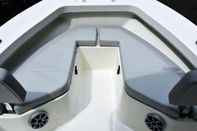 Slide: The Image of 2023 Maycraft 208 boat interior with cushioned seating and speakers. - 4