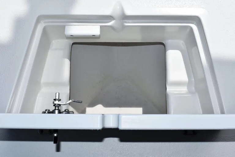 Slide: The Image of 2023 Maycraft 208 boat compartment with latch, showcasing interior design and functionality. - 5