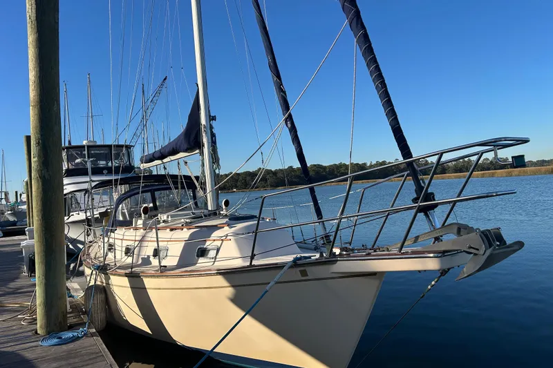 The Image of 1997 Island Packet 29 sailboat docked on a sunny day. - 0