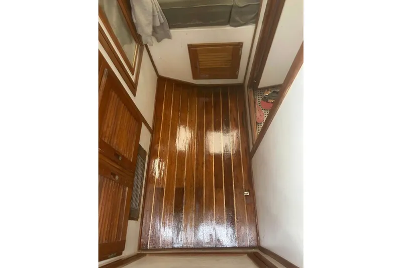 Slide: The Image of Polished wooden interior of 1998 Eastern JC Casco Bay 31' boat cabin. - 7