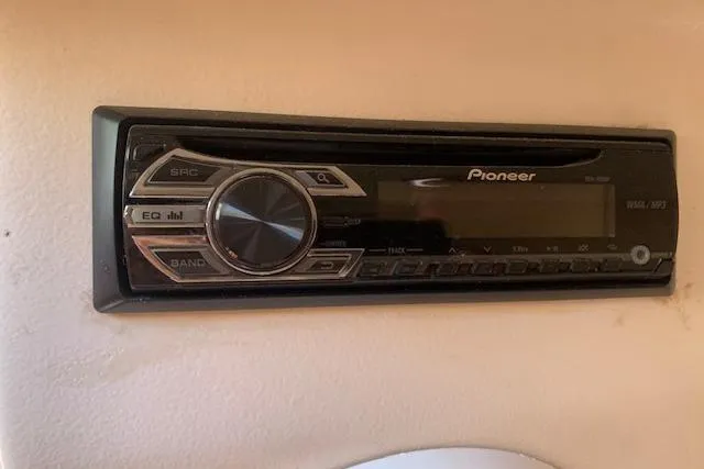 Slide: The Image of Pioneer stereo system in 2004 Mainship Pilot 30-II boat interior. - 19