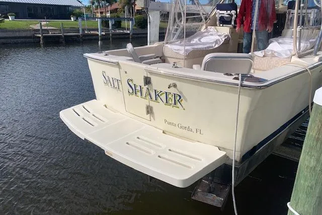 Slide: The Image of 2004 Mainship Pilot 30-II boat named "Salt Shaker" docked in Punta Gorda, FL. - 5
