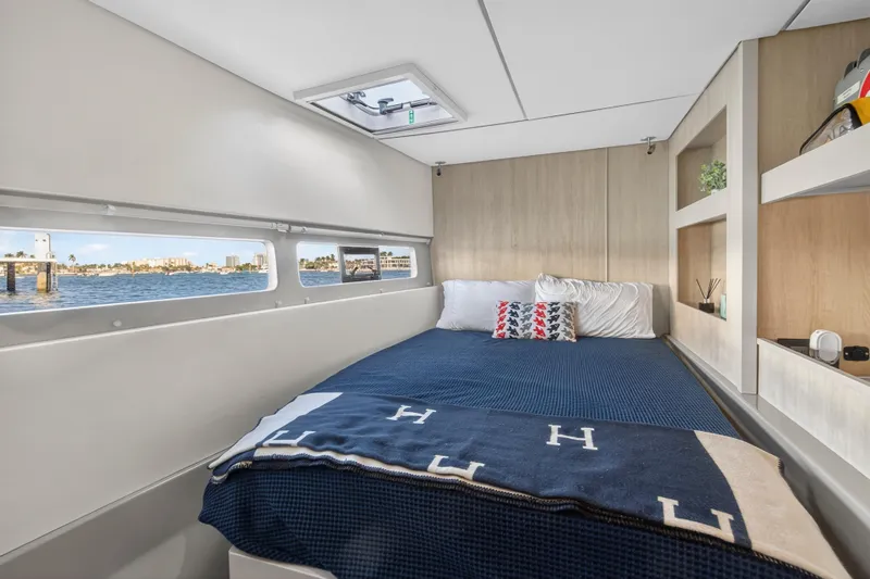 Slide: The Image of Luxurious cabin interior of 2019 Leopard 58 yacht with scenic water view. - 24