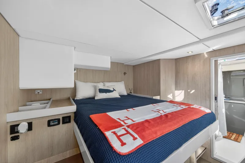 Slide: The Image of Luxurious cabin interior of 2019 Leopard 58 yacht with cozy bedding and modern design. - 30