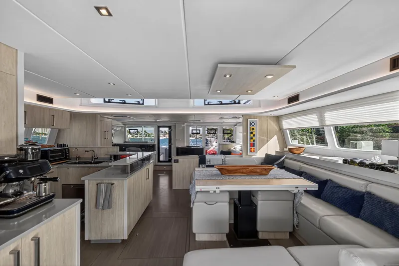 Slide: The Image of Luxurious interior of 2019 Leopard 58 yacht with modern kitchen and seating area. - 7
