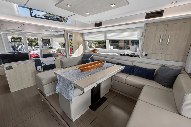 Slide: The Image of Luxurious interior of a 2019 Leopard 58 yacht with modern seating and decor. - 9