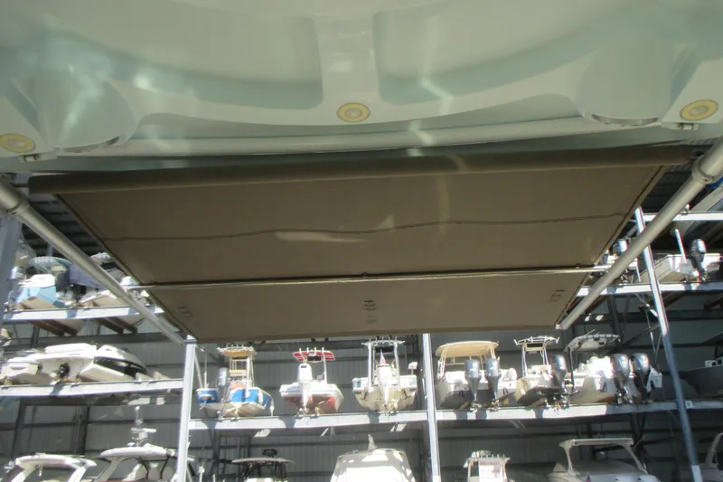 Slide: The Image of 2019 Sailfish 325 DC boat helm with steering wheel and control panel. - 18