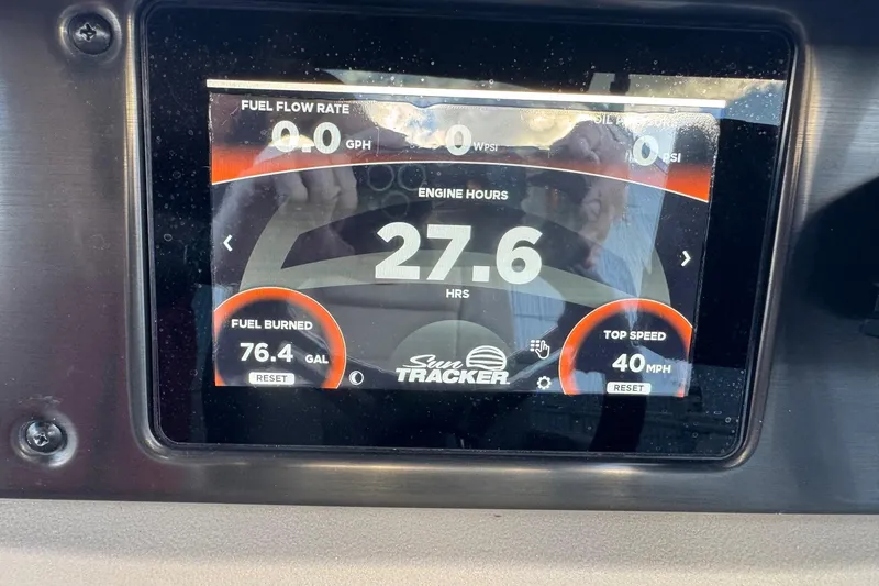 Slide: The Image of 2024 Sun Tracker SportFish 20 DLX dashboard displaying engine hours, fuel burned, and top speed. - 10