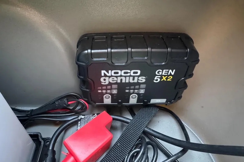 Slide: The Image of NOCO Genius GEN5X2 charger in 2024 Sun Tracker SportFish 20 DLX boat. - 24