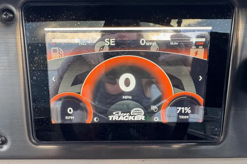 Slide: The Image of 2024 Sun Tracker SportFish 20 DLX dashboard display showing speed, RPM, and trim settings. - 8