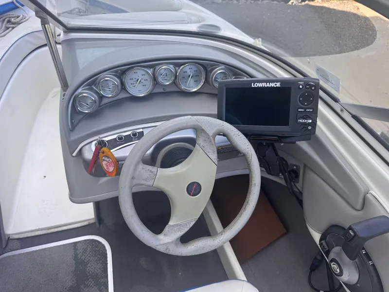 Slide: The Image of Dashboard of a 2006 Bayliner 185 with Lowrance GPS. - 7
