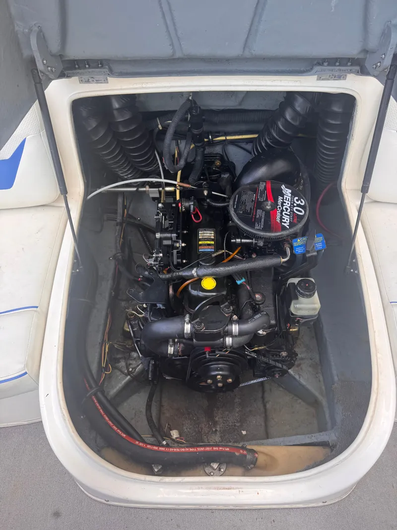 Slide: The Image of Engine compartment of a 2006 Bayliner 185 with MerCruiser 3.0L engine. - 8