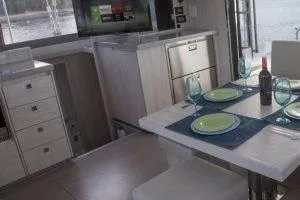 Slide: The Image of Luxurious interior of 2018 Leopard 40 catamaran with dining area and ocean view. - 11