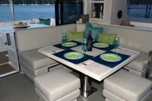 Slide: The Image of Luxurious interior of 2018 Leopard 40 catamaran with dining area and ocean view. - 19