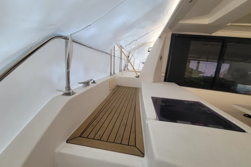 Slide: The Image of Interior view of a 2018 Leopard 40 yacht with sleek wooden flooring. - 27
