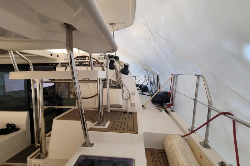Slide: The Image of Interior view of a 2018 Leopard 40 catamaran, showcasing deck and helm area. - 28
