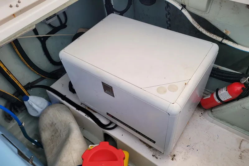 Slide: The Image of Electrical compartment of a 2018 Leopard 40 boat with fire extinguisher and wiring. - 33