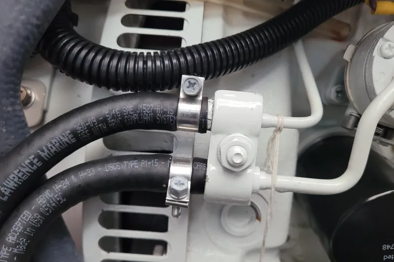 Slide: The Image of Close-up of 2018 Leopard 40 marine engine hoses and clamps. - 36