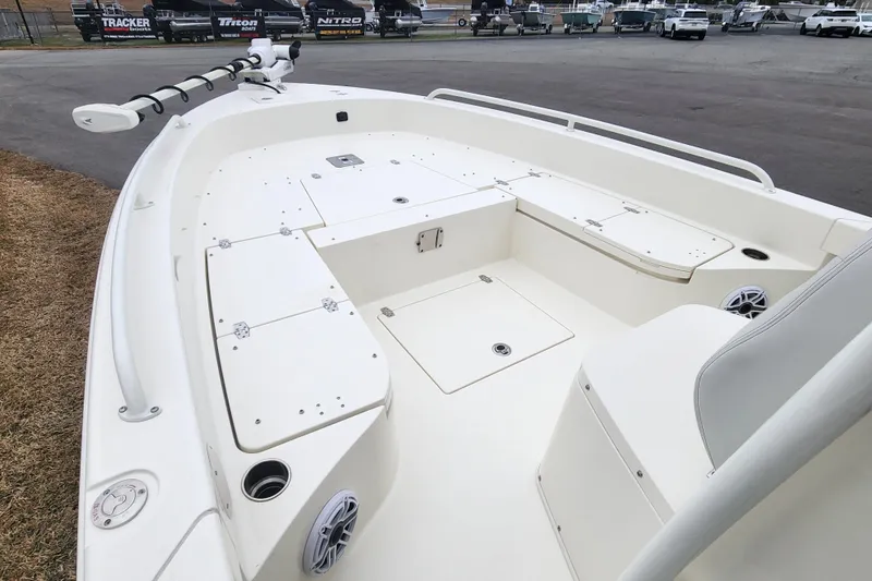 Slide: The Image of 2024 Pathfinder 2600 TRS boat interior with spacious deck and storage compartments. - 8