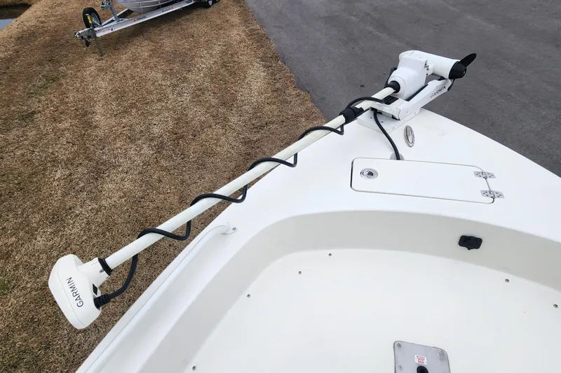 Slide: The Image of 2024 Pathfinder 2600 TRS boat with Garmin trolling motor on deck. - 9