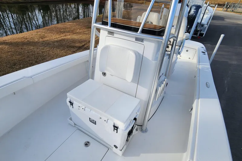 Slide: The Image of 2025 BlackJack 256 Coastal boat interior with seating and storage. - 10