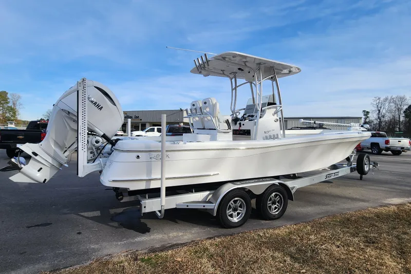Slide: The Image of 2025 BlackJack 256 Coastal boat on trailer, featuring Yamaha outboard motor. - 5