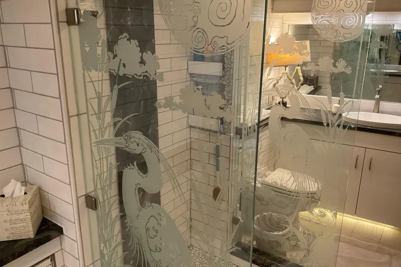 Slide: The Image of Etched glass shower door with heron design on 1997 Hatteras 70 Sport Deck Motor Yacht. - 29