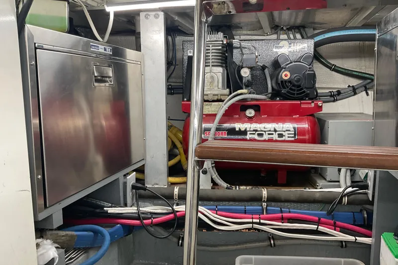 Slide: The Image of Engine room of 1997 Hatteras 70 Sport Deck Motor Yacht with Magna Force compressor. - 44