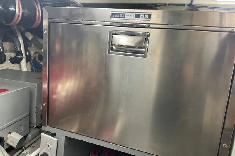 Slide: The Image of Stainless steel appliance in 1997 Hatteras 70 Sport Deck Motor Yacht engine room. - 48