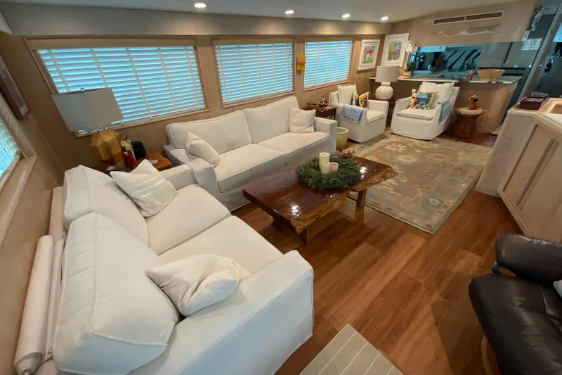 Slide: The Image of Luxurious interior of 1997 Hatteras 70 Sport Deck Motor Yacht with elegant furnishings. - 7