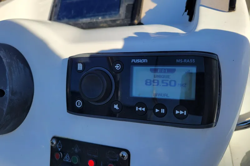 Slide: The Image of Fusion MS-RA55 radio on 2018 Walker Bay Generation 400 DLX boat dashboard. - 10