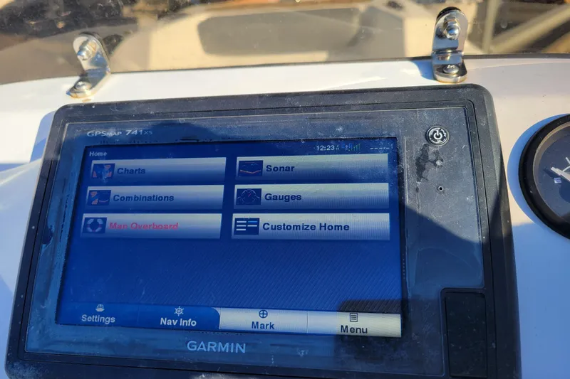 Slide: The Image of Garmin GPSMAP 741xs display on 2018 Walker Bay Generation 400 DLX boat dashboard. - 11