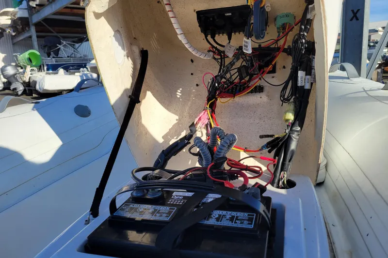Slide: The Image of 2018 Walker Bay Generation 400 DLX boat wiring and battery compartment. - 14