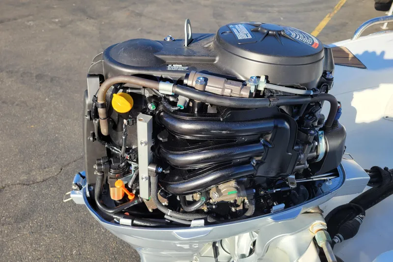 Slide: The Image of 2018 Walker Bay Generation 400 DLX outboard motor, detailed view of engine components. - 20