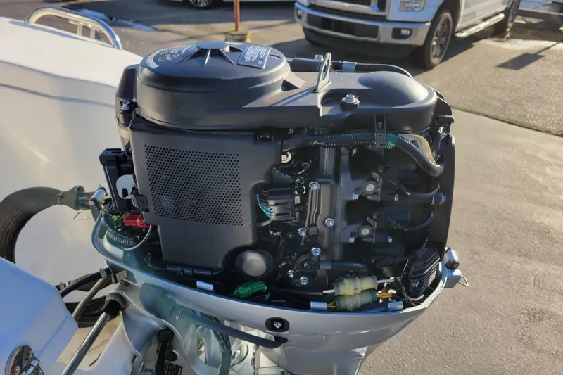 Slide: The Image of 2018 Walker Bay Generation 400 DLX outboard motor, detailed view in sunlight. - 21