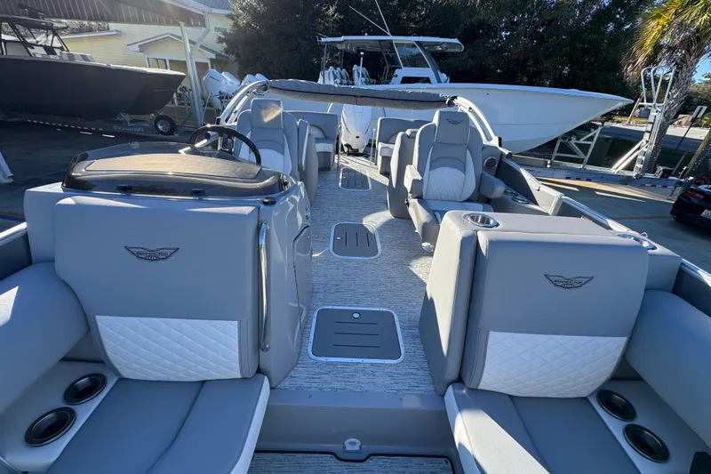 Slide: The Image of 2026 Bennington 23 LTFB pontoon boat interior with luxurious seating and modern design. - 22