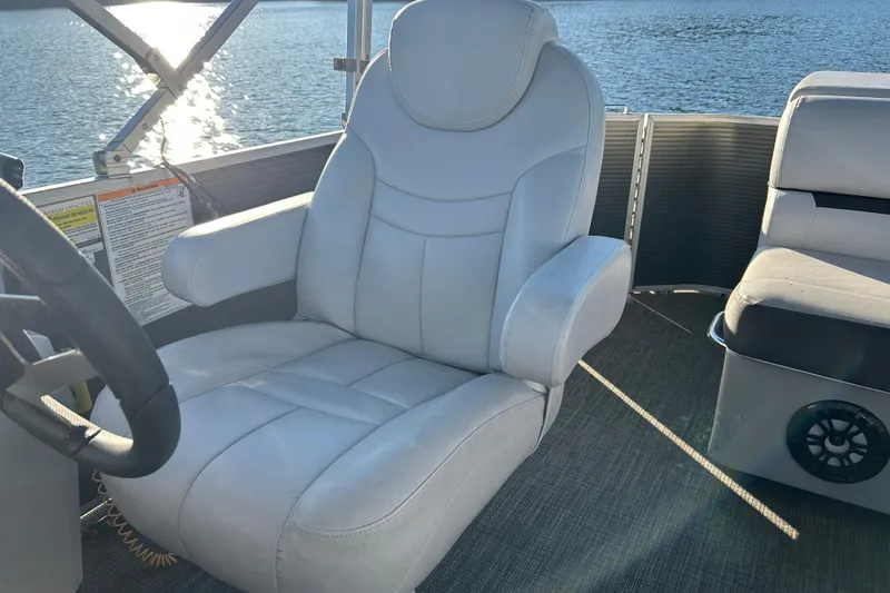 Slide: The Image of Captain's chair on 2023 Godfrey Sweetwater 2286 C pontoon boat, with lake view. - 13
