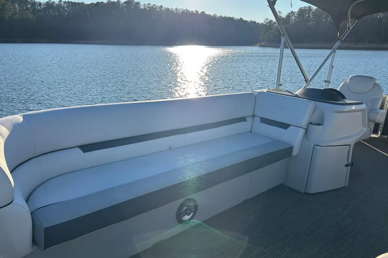 Slide: The Image of 2023 Godfrey Sweetwater 2286 C pontoon boat interior with lake view. - 17