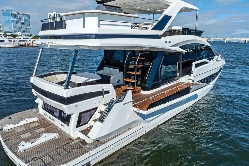 Slide: The Image of 2018 Galeon 640 Fly yacht on water, showcasing sleek design and luxury features. - 10