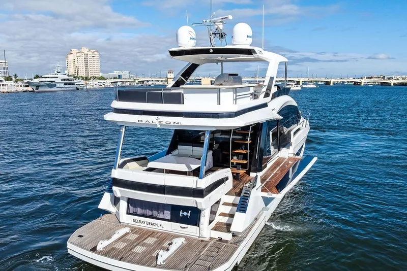 Slide: The Image of 2018 Galeon 640 Fly yacht cruising in Delray Beach, FL, with modern design and spacious decks. - 11