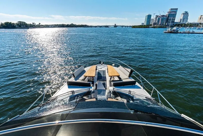 Slide: The Image of Luxurious 2018 Galeon 640 Fly yacht cruising on a sunny day with city skyline view. - 19