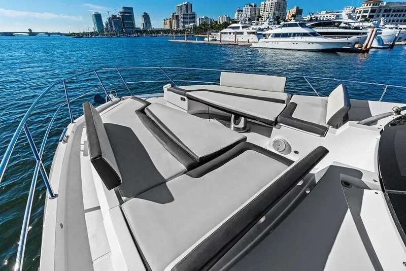 Slide: The Image of Luxurious 2018 Galeon 640 Fly yacht with spacious sunbathing area, docked in a marina. - 22