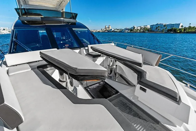 Slide: The Image of Luxurious 2018 Galeon 640 Fly yacht with sleek seating, cruising on a sunny day. - 24
